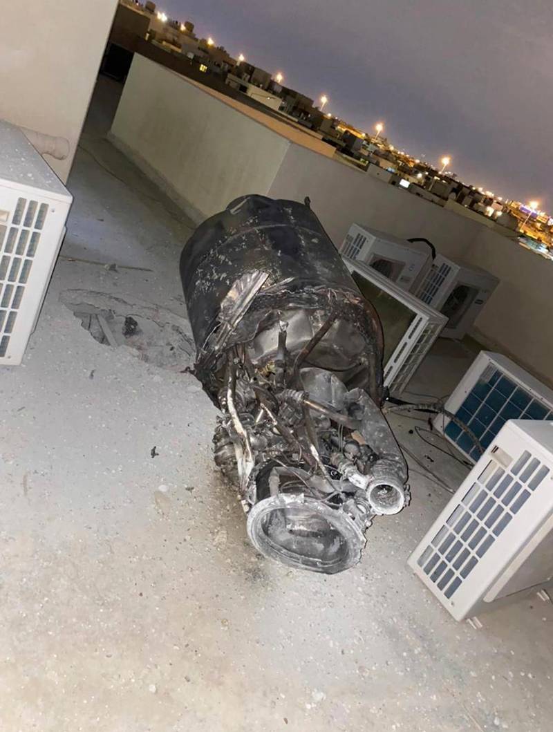 The remnants of a missile fired by Yemen's Houthi rebels, on a house rooftop in Saudi Arabia's capital Riyadh. SPA via AP