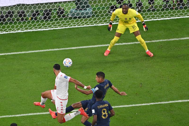 Tunisia's Nader Ghandri flicks the ball into the France net but the goal was disallowed for offside. AFP
