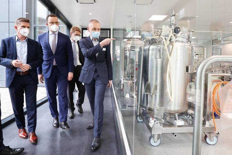German Health Minister Jens Spahn visits the Allergopharma plant in Reinbek near Hamburg, northern Germany. The company has started production of Pfizer/BioNTech's vaccine. AFP