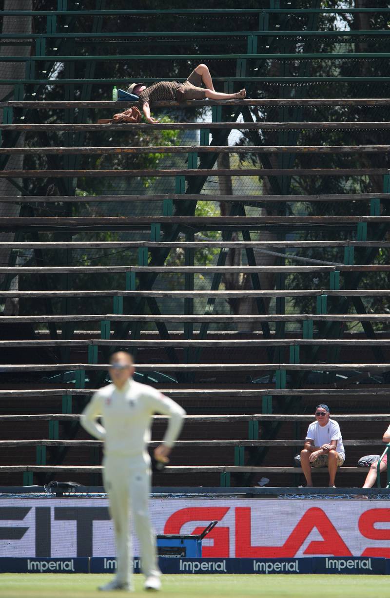 A spectator enjoys a nap during play during Day 3 of the fourth Test between South Africa and England at the Wanderers in Johannesburg, on Sunday, January 26. Getty