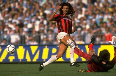 May 1988:  Ruud Gullit (left) of AC Milan in action during the Serie A  match against Napoli in Napoli, Italy. AC Milan won the match 3-2. \ Mandatory Credit: Allsport UK /Allsport