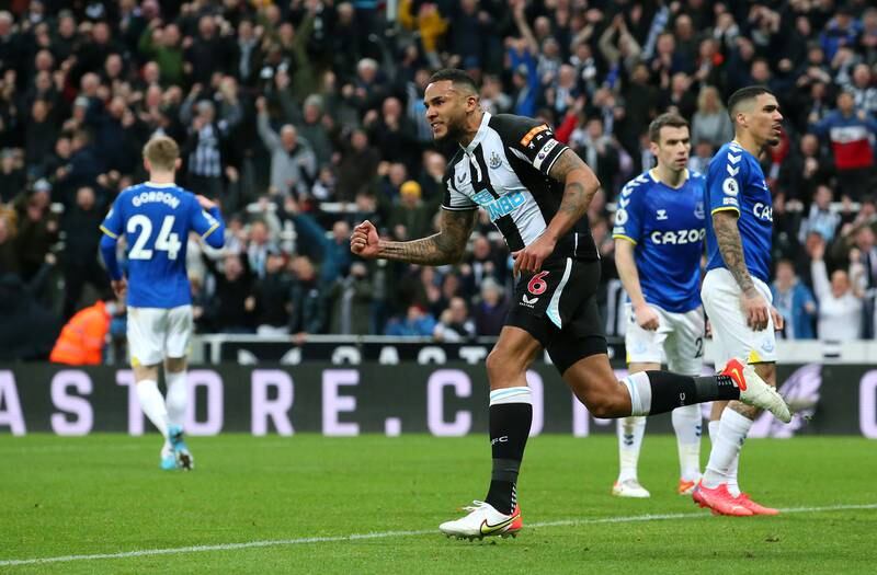 Newcastle's Jamaal Lascelles celebrates after his header led to Mason Holgate scoring an own goal. Getty