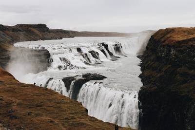Experience some of Iceland's most epic waterfalls while travelling along its Ring Road, including the Gullfoss Falls. Photo: Sydney Russakov / Unsplash