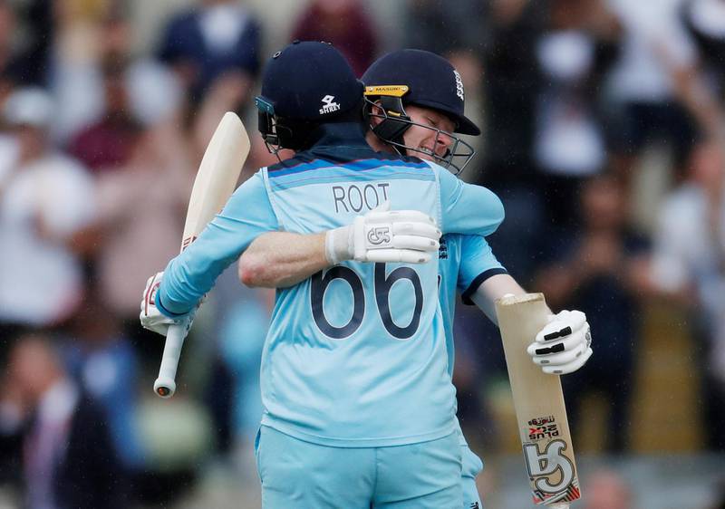 Cricket - ICC Cricket World Cup Semi Final - Australia v England - Edgbaston, Birmingham, Britain - July 11, 2019   England's Eoin Morgan and Joe Root celebrate after the match         Action Images via Reuters/Paul Childs