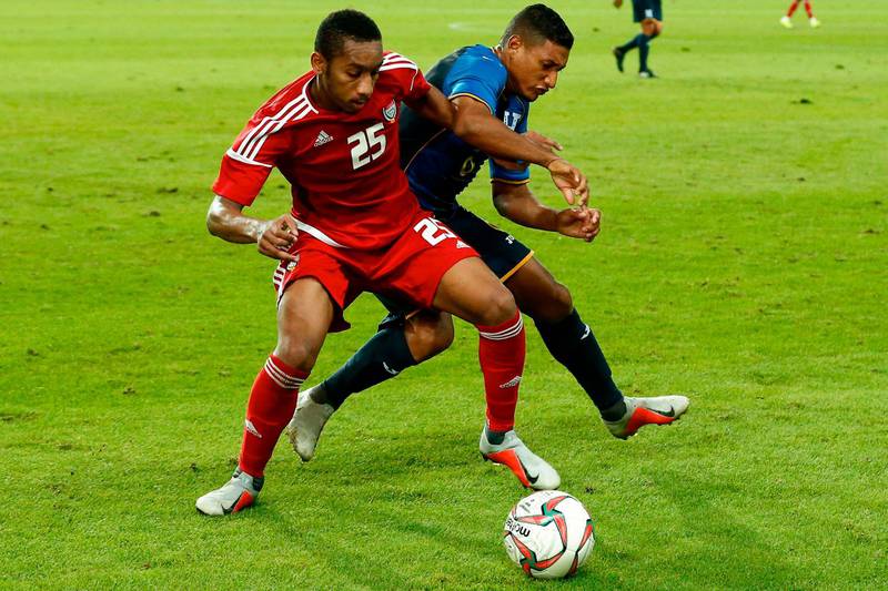 UAE's midfielder Ali Salmeen (L) vies with Honduras' midfielder Bryan Acosta  during a friendly football match between United Arab Emirates and  Honduras at the Estadi Olimpic Lluis Companys in Barcelona. AFP