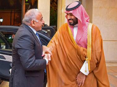 Saudi Crown Prince Mohammed bin Salman, right, shaking hands with Iraqi Prime Minister Adel Abdel Mahdi during a reception for the latter in the Saudi Red Sea coastal city of Jeddah. AFP