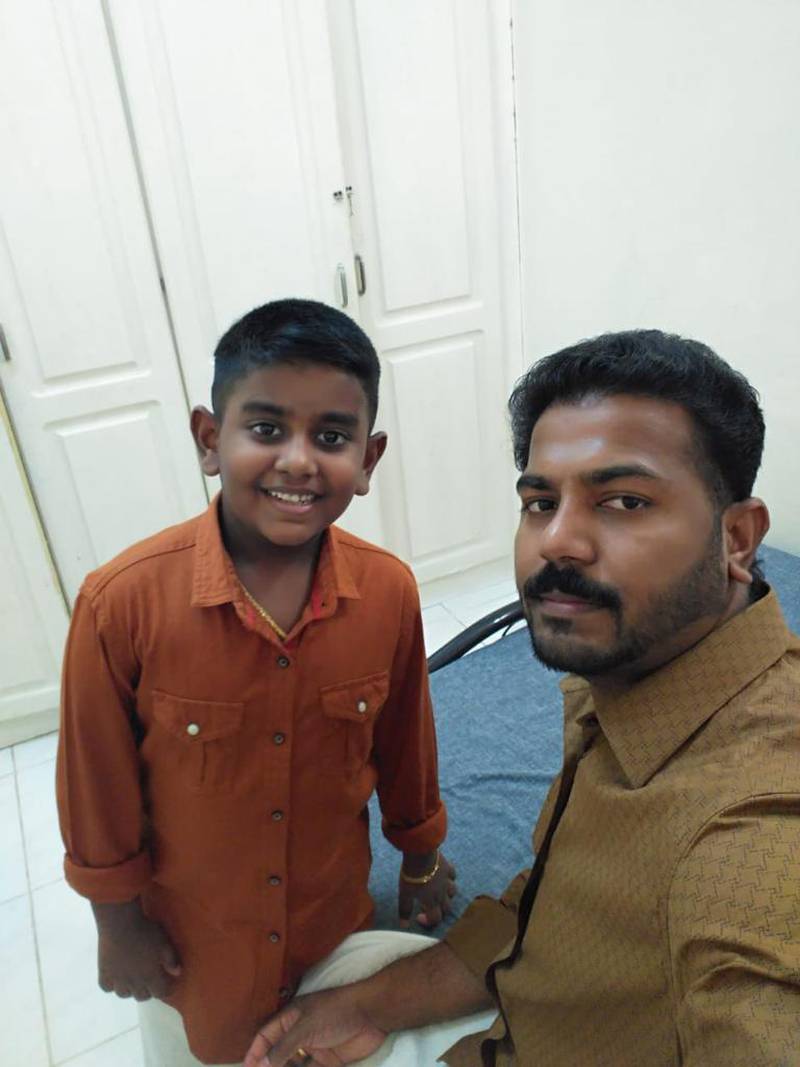 Renjith Somarajan (right) won Dh20 million from the Abu Dhabi Big Ticket draw. He said the money will help him support his son Niranjan (pictured) and his wife
