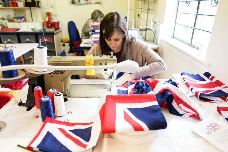 Fiona Baxter makes Union flags at the Flying Colours Flagmakers factory in Knaresborough. Getty Images