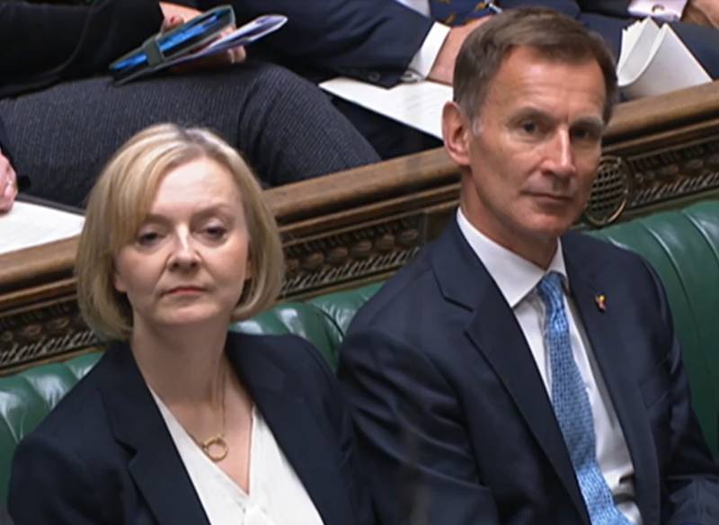 UK Chancellor Jeremy Hunt, pictured in the House of Commons with Liz Truss, who has resigned at prime minister, has warned of major cuts. PA