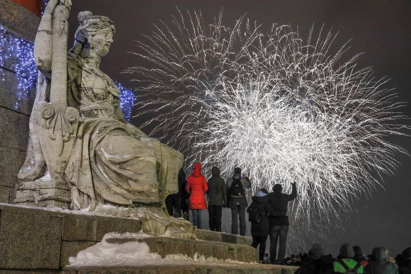 People watch fireworks during New Year celebration in downtown St.Petersburg, Russia, Tuesday, Jan. 1, 2019. AP Photo
