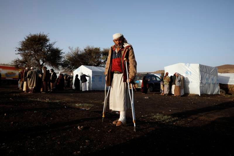 A displaced Yemeni stands at a camp on the outskirts of Sanaa, Yemen. EPA