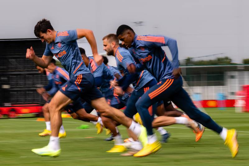 Harry Maguire and Marcus Rashford in action during a Manchester United training session at Carrington. All pictures Getty