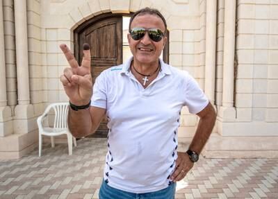 Antoine Harb after casting his vote at the Embassy of Lebanon in Abu Dhabi. Victor Besa / The National