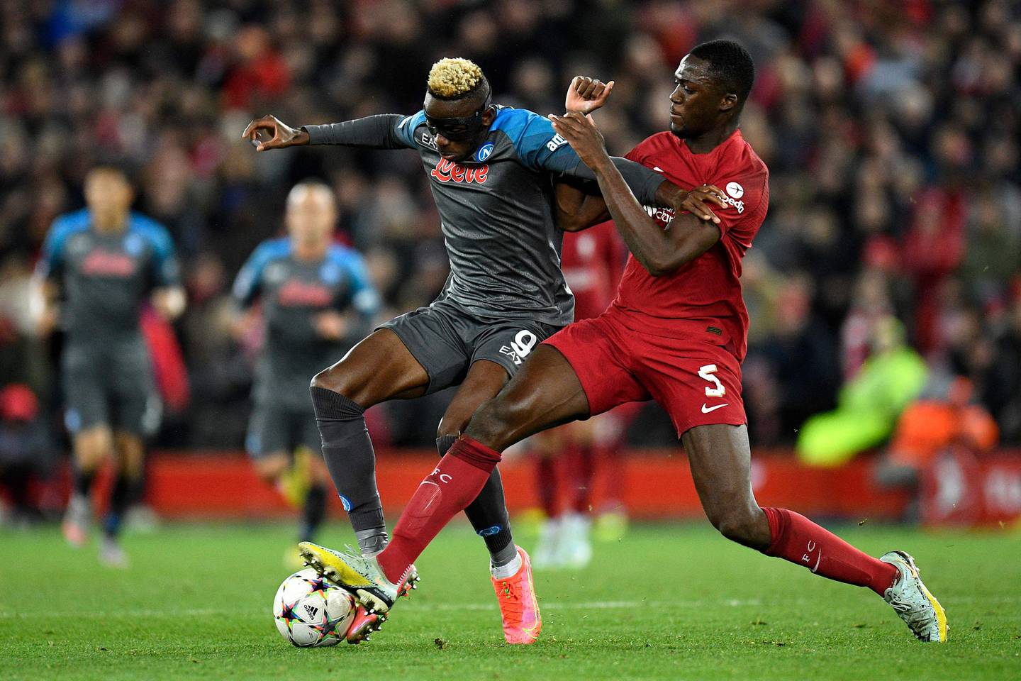 Napoli's Victor Osimhen, left, vies with Liverpool defender Ibrahima Konate. AFP