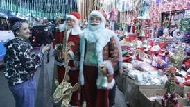 Cairo celebrates Christmas with Santa Claus, twinkling lights and reindeer antlers