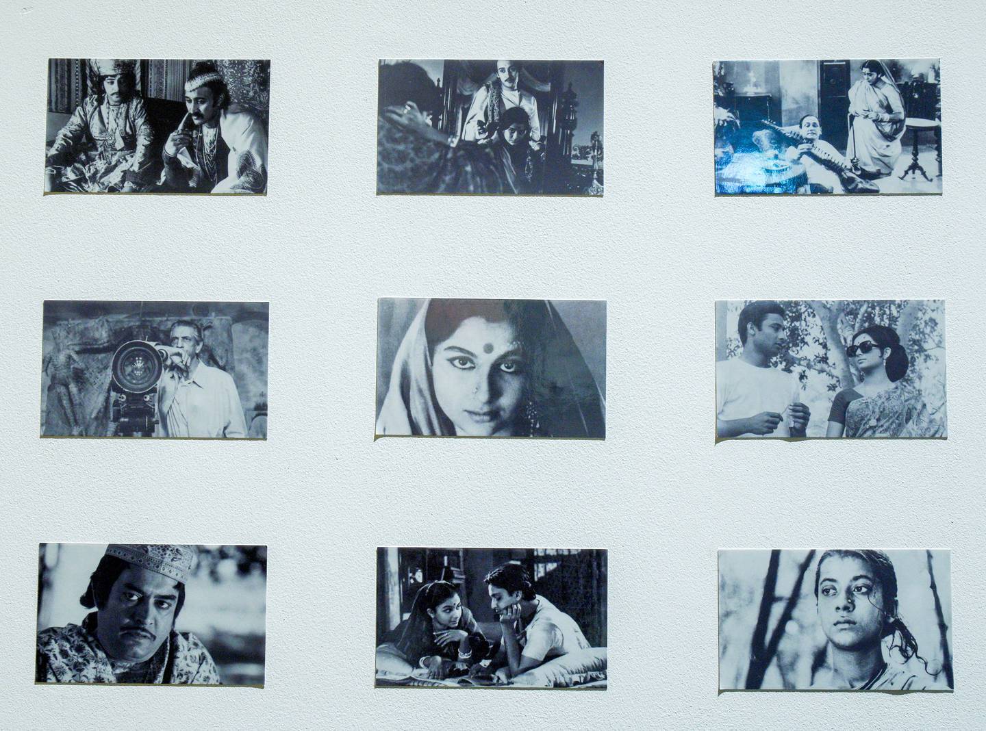 A display of black and white photographs from the movies of renowned director Satyajit Ray. Victor Besa / The National