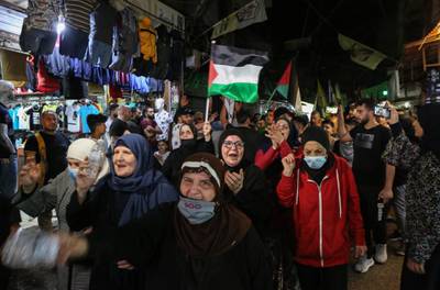Supporters of Palestinian factions demonstrate in support of the Palestinians facing eviction in a Jerusalem neighbourhood, at Bourj Al Barajneh Palestinian camp in the southern suburb of Beirut, Lebanon. EPA