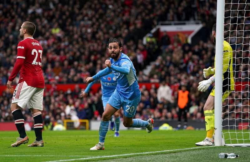 Bernardo Silva celebrates scoring Manchester City's second goal against Manchester United in the Premier League match at Old Trafford on Saturday, November 6, 2021. PA