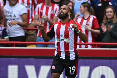 Brentford's Bryan Mbeumo celebrates after scoring their first goal from the penalty spot. AFP