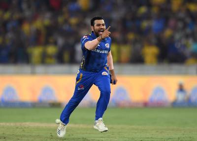 Mumbai Indians cricket captain Rohit Sharma celebrates after winning the 2019 Indian Premier League (IPL) Twenty20 final cricket match between Mumbai Indians and Chennai Super Kings at the Rajiv Gandhi International Cricket Stadium in Hyderabad on May 12, 2019. (Photo by NOAH SEELAM / AFP) / ----IMAGE RESTRICTED TO EDITORIAL USE - STRICTLY NO COMMERCIAL USE-----