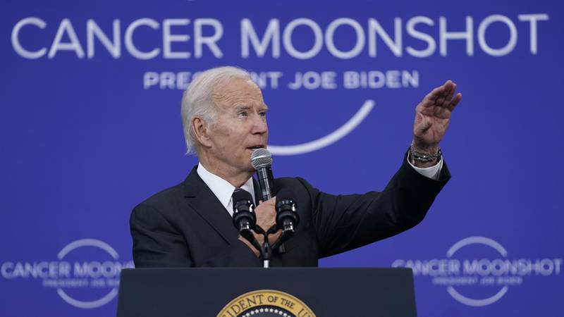 US President Joe Biden speaks on the cancer moonshot initiative at the John F Kennedy Library and Museum in Boston. AP