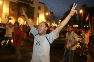 A man shouts during a protest demanding more public sector jobs in Rabat.