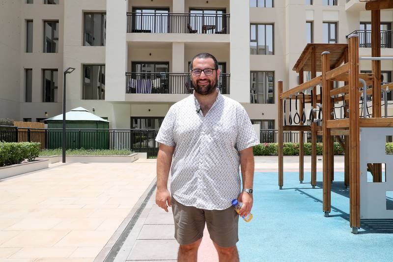 Mohamad Hussein rents a two-bedroom unit at the Town Square Hayat Boulevard apartments in Dubai. Pawan Singh / The National