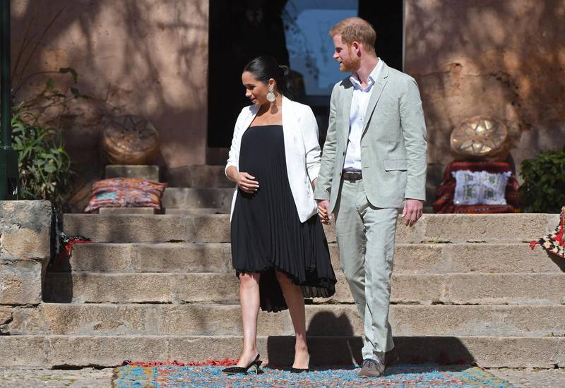 Prince Harry and Meghan, Duchess of Sussex, in Loyd/Ford and Babaton, visit the Kasbah of the Udayas near Rabat on February 25, 2019. AFP