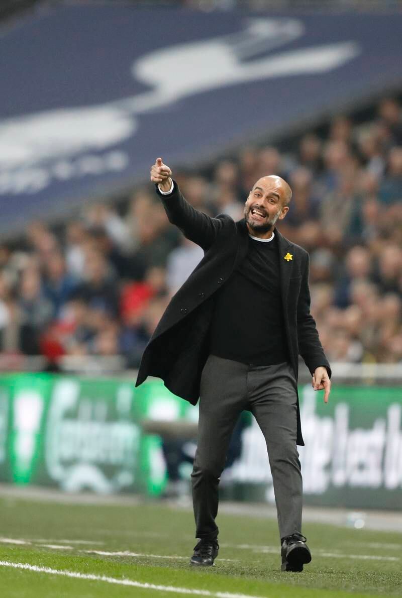 Manchester City manager Pep Guardiola issues instructions from the touchline. Frank Augstein / AP Photo