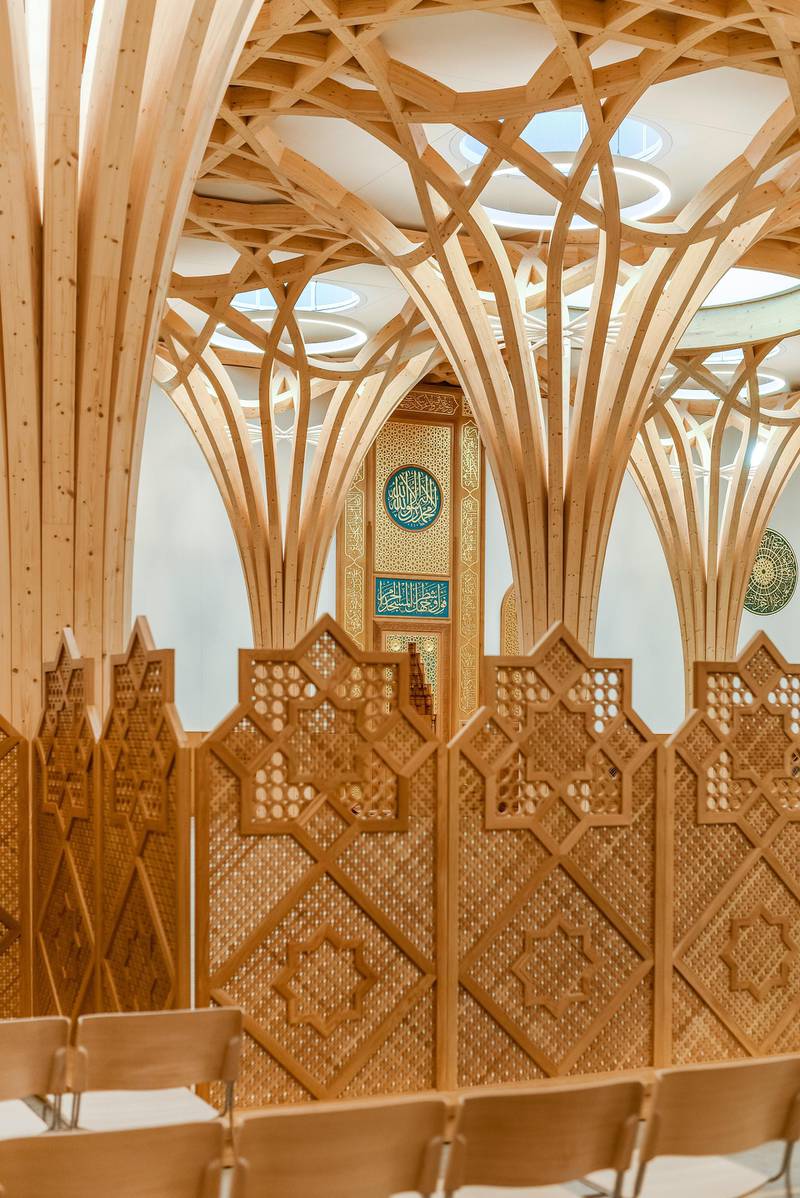 The ceiling supports are arranged in a geometric design that mirrors the 'breath of the divine' in Islamic art.
