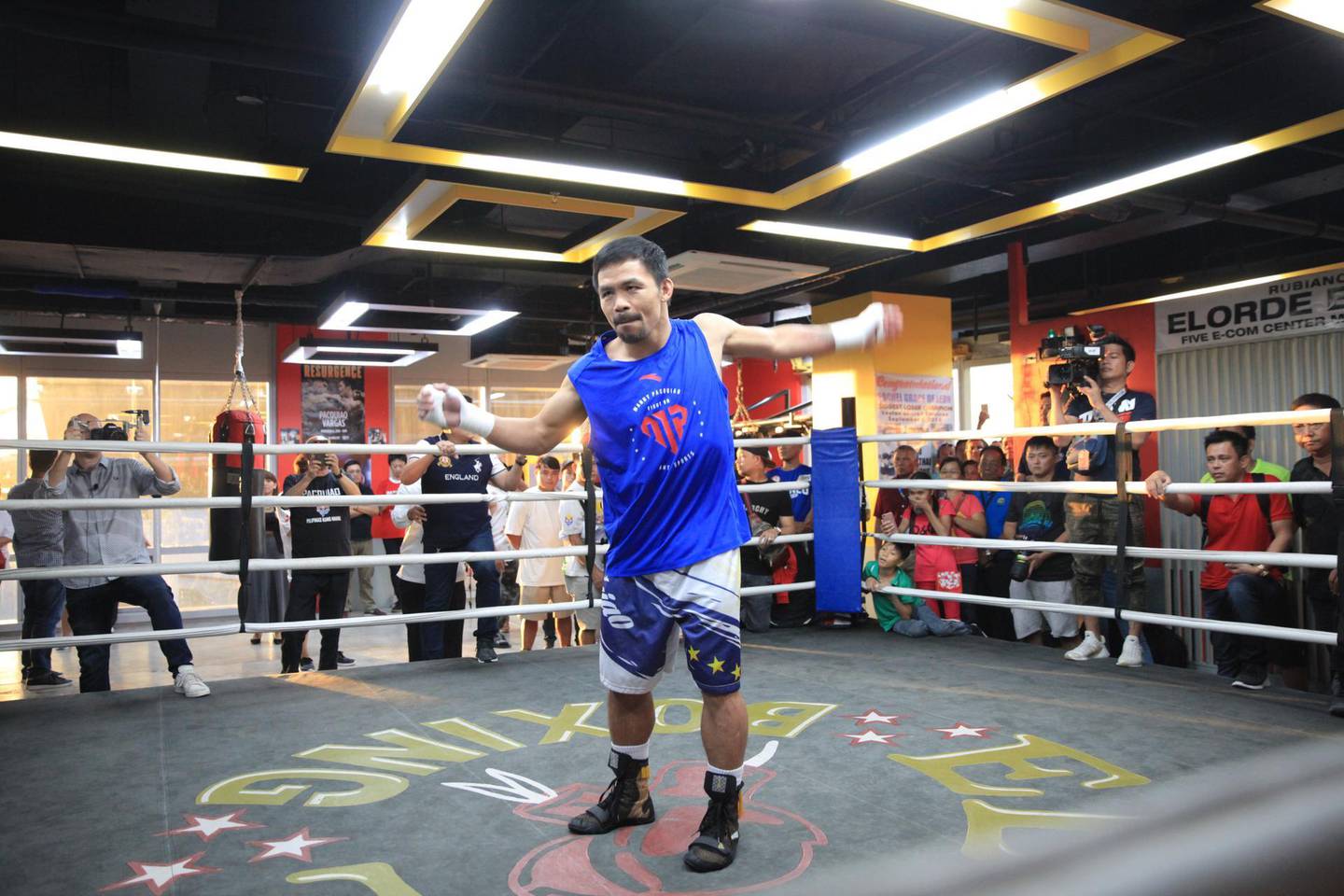 Manny Pacquiao loosens up before beginning pad work. Jake Verzosa for The National
