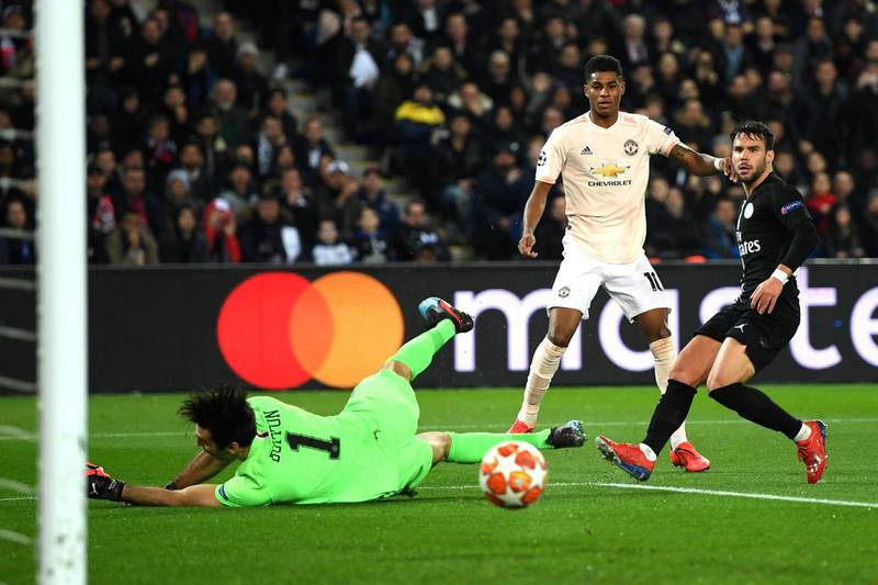PARIS, FRANCE - MARCH 06:  Marcus Rashford of Manchester United shoots past Gianluigi Buffon of PSG during the UEFA Champions League Round of 16 Second Leg match between Paris Saint-Germain and Manchester United at Parc des Princes on March 06, 2019 in Paris, . (Photo by Shaun Botterill/Getty Images)