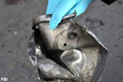 he FBI says it has evidence that indicates one of the bombs was contained in a pressure cooker with nails and ball bearings, and it was hidden in a backpack.
