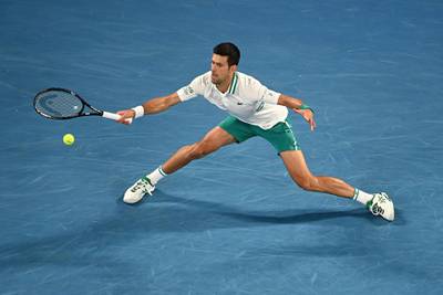 Novak Djokovic plays a forehand at Melbourne Park. Getty
