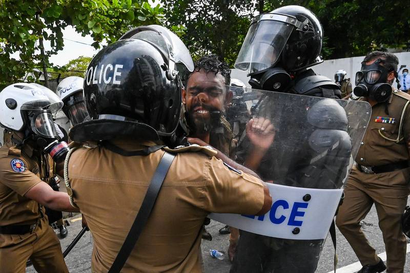 A number of people were arrested by the police, who carried riot shields and batons. AFP