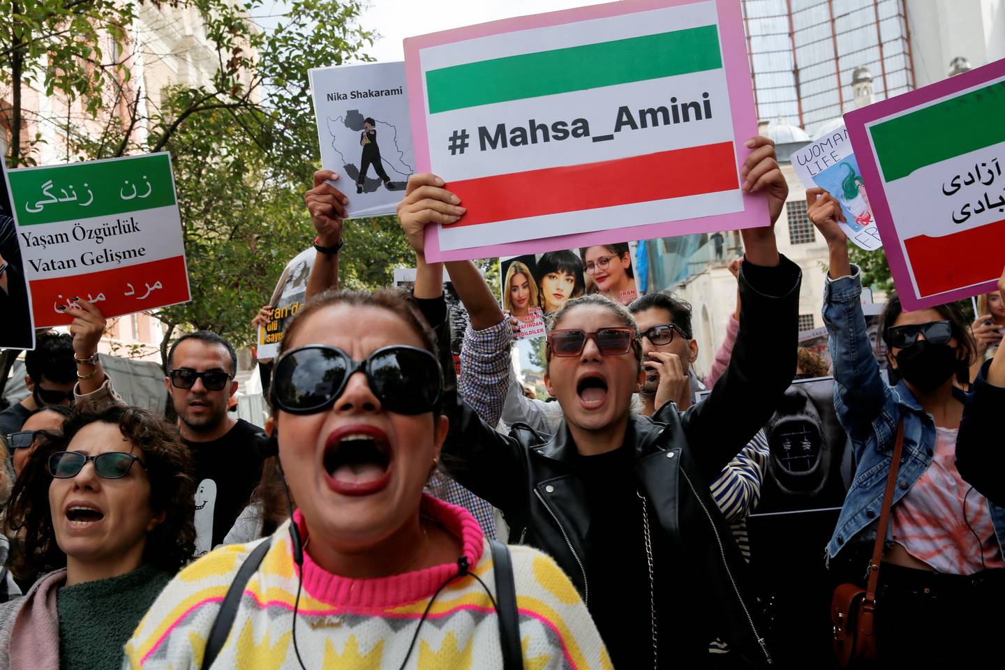 Women at a protest in Istanbul against Iran's regime following the death of Mahsa Amini. Reuters

