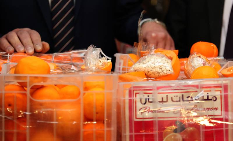 Fake oranges filled with Captagon pills that were distributed among boxes containing real fruit. The shipment was intercepted by customs and anti-drug teams at Beirut port, in the Lebanese capital, on December 29, 2021.  The nine million Captagon pills were destined for an unnamed Gulf country, Lebanon's Interior Minister Bassan al-Mawlawi said.  AFP