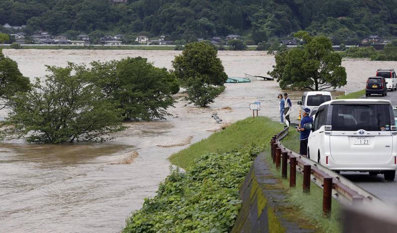 Rising water caused by a heavy rain is seen along Kuma river in Yatsushiro, Kumamoto prefecture. Reuters