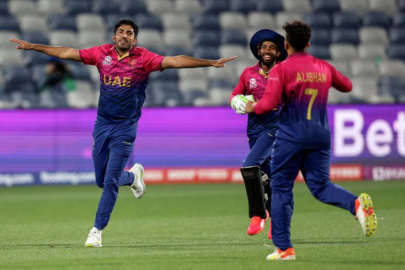 UAE bowler Junaid Siddique celebrates the wicket of Namibia's Stephan Baard for four. AFP