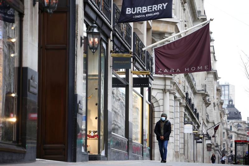 FILE PHOTO: People walk along Regent Street as shops remain closed under Tier 4 restrictions, amid the coronavirus disease (COVID-19) outbreak, in London, Britain, December 26, 2020. REUTERS/Henry Nicholls/File Photo