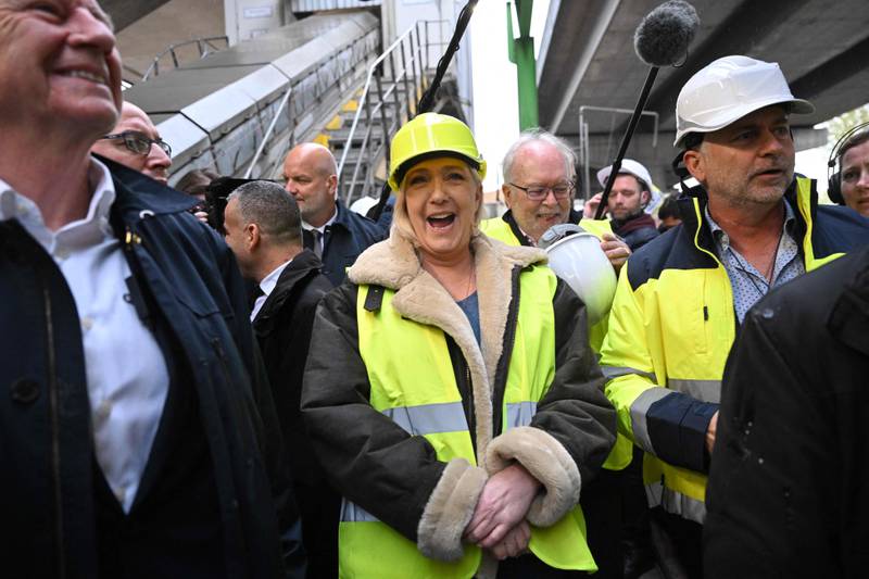 A laughing Ms Le Pen at a campaign meeting near Paris. AFP