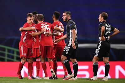 Bayern players celebrate at the end of the match. AP