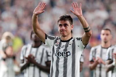 Paulo Dybala of Juventus acknowledges the fans during a tribute from teammates. Getty Images