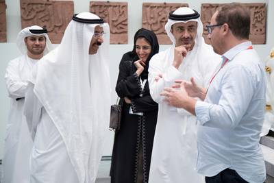 SAADIYAT ISLAND, ABU DHABI, UNITED ARAB EMIRATES -September 11, 2017: HH Sheikh Abdullah bin Zayed Al Nahyan, UAE Minister of Foreign Affairs and International Cooperation (R) and HE Mohamed Al Murr, former Speaker of the UAE Federal National Council (FNC) (L), tour the Louvre Abu Dhabi. Seen with HE Dr Ahmed Mubarak Al Mazrouei, Chairman of the Abu Dhabi Water and Electricity Authority (ADWEA), and Secretary-General of the Executive Council (back L) and HE Najla Al Awar, UAE Minister of Community Development (back R). 

( Omar Al Askar  for The Crown Prince Court - Abu Dhabi )
---