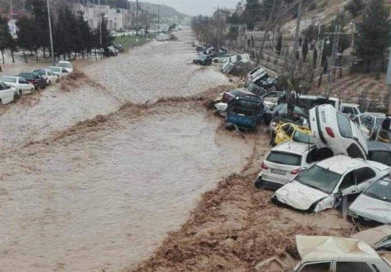 Vehicles are stacked one against another after a flash flooding In Shiraz. Reuters
