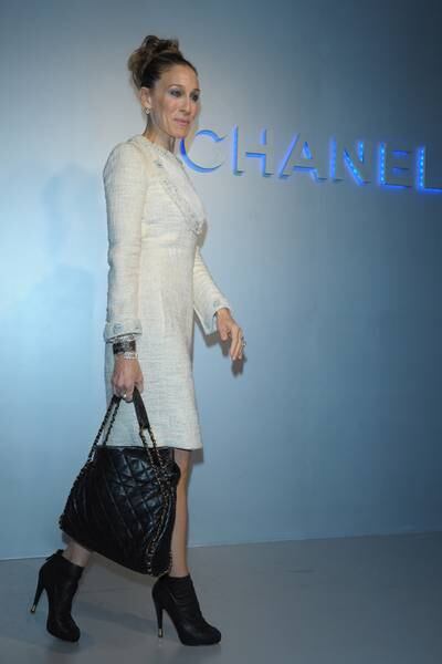 Sarah Jessica Parker, in white Chanel, attends the Chanel 2012 spring/summer haute couture collection show in Tokyo on March 22, 2012. Getty