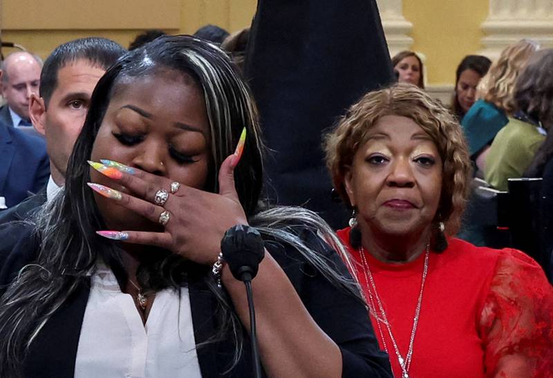 Wandrea "Shaye" Moss, a former Elections Department employee in Georgia, testifies before the US House committee investigating former president Donald Trump, as her mother, Georgia election worker Ruby Freeman, looks on. Reuters