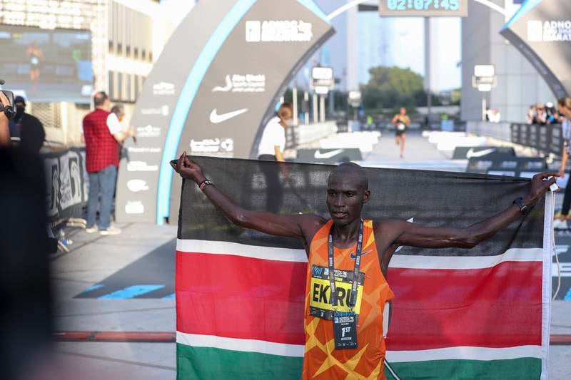 Titus Ekiru celebrates his win in the Adnoc Abu Dhabi Marathon.