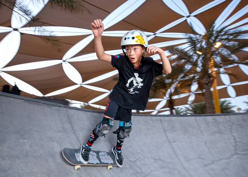 Christian Bruan, 8, a Filipino-American, at Xpark by Etisalat on Kite Beach, Dubai. He loves the 50/50 grind, rock and roll and the frontside grabs over the coping. All photos: Victor Besa / The National
