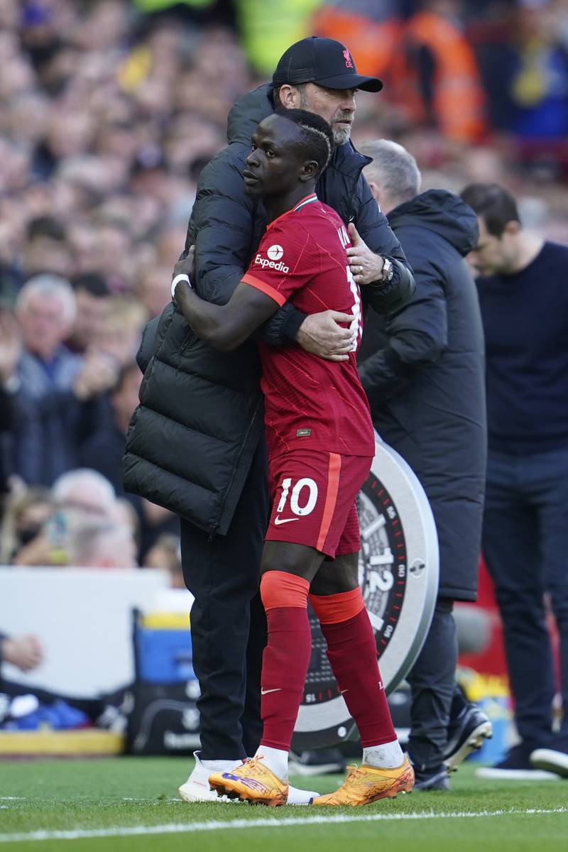 Liverpool manager Jurgen Klopp hugs Sadio Mane. AP